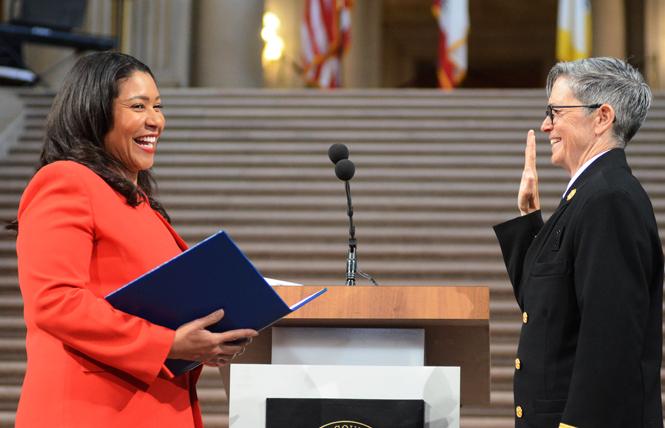 Mayor London Breed, left, administered the oath of office to San Francisco Fire Chief Jeanine Nicholson during a May 2019 ceremony in City Hall. Photo: Rick Gerharter