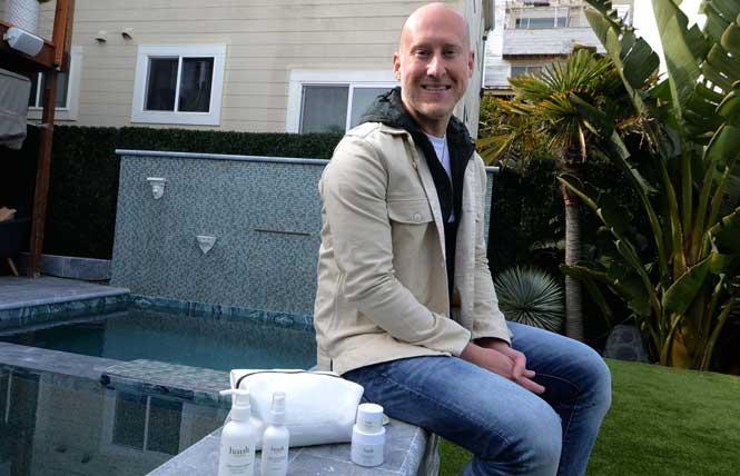 Brian Diethorn sits in the backyard of his San Francisco home with some of his hault skincare products. Photo: Rick Gerharter<br><br>