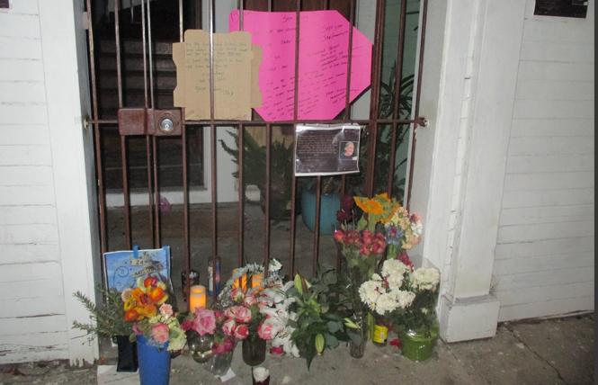 A growing memorial lies outside Brian Egg's Clara Street home. Photo: Ed Walsh